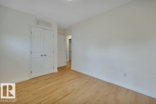 Bright interior space with light wood-finish flooring - 10633 St Gabriel School Road, Edmonton, AB - Indoor Photo Showing Other Room