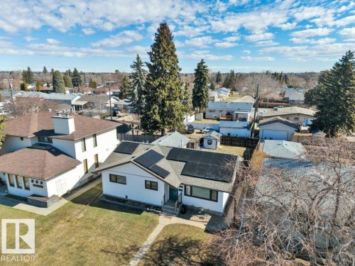 Gabled roofline home featuring solar panel installation - 10633 St Gabriel School Road, Edmonton, AB - Outdoor With View