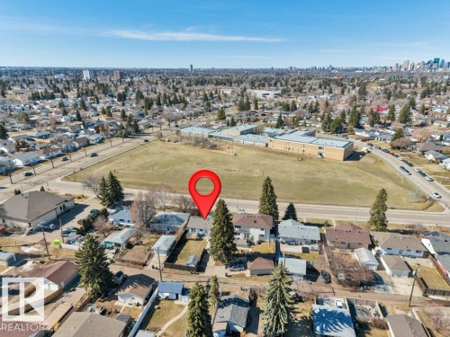 Aerial perspective highlighting a residential property within a suburban setting - 10633 St Gabriel School Road, Edmonton, AB - Outdoor With View