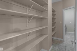 Built-in shelving units providing extensive storage - 