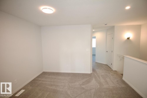 Upper 3716 42 Avenue, Beaumont, AB - Indoor Photo Showing Other Room