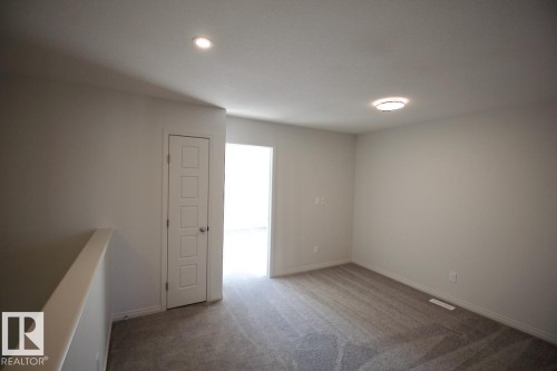 Upper 3716 42 Avenue, Beaumont, AB - Indoor Photo Showing Other Room