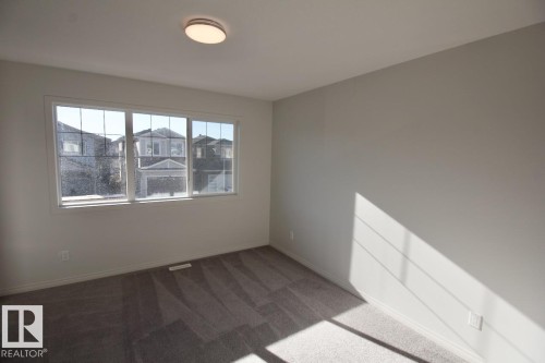 Upper 3716 42 Avenue, Beaumont, AB - Indoor Photo Showing Other Room