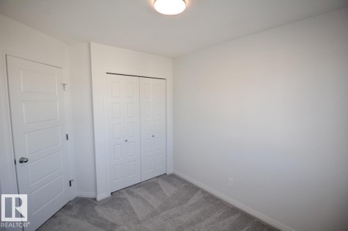 Upper 3716 42 Avenue, Beaumont, AB - Indoor Photo Showing Other Room