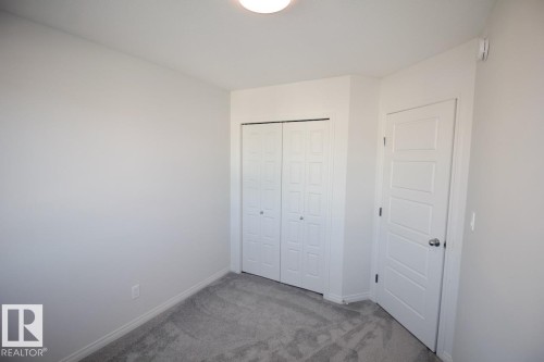 Upper 3716 42 Avenue, Beaumont, AB - Indoor Photo Showing Other Room