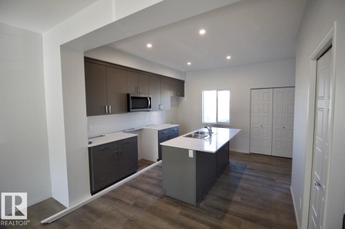 Upper 3716 42 Avenue, Beaumont, AB - Indoor Photo Showing Kitchen With Double Sink