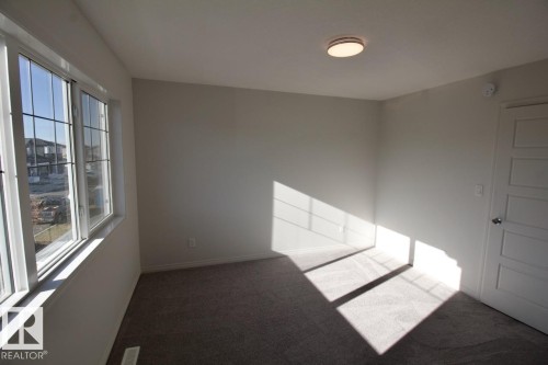 Upper 3716 42 Avenue, Beaumont, AB - Indoor Photo Showing Other Room