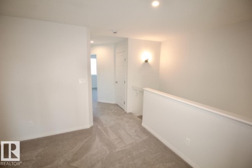 Upper 3716 42 Avenue, Beaumont, AB - Indoor Photo Showing Other Room