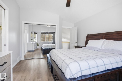 Bright room with wood-finish flooring and ample natural light - 2251 Brennan Court, Edmonton, AB - Indoor Photo Showing Bedroom