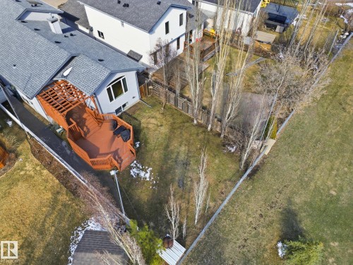 Expansive tiered wood deck with built-in railing, offering outdoor living space - 2251 Brennan Court, Edmonton, AB - Outdoor