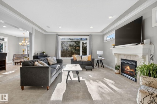 918 Hollingsworth Bend, Edmonton, AB - Indoor Photo Showing Living Room With Fireplace