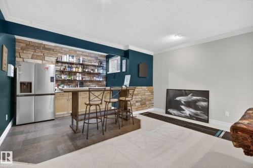 918 Hollingsworth Bend, Edmonton, AB - Indoor Photo Showing Living Room With Fireplace