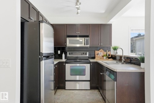 41 230 Edwards Drive, Edmonton, AB - Indoor Photo Showing Kitchen With Stainless Steel Kitchen With Double Sink