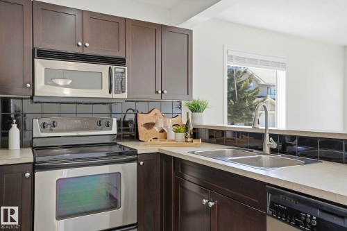 41 230 Edwards Drive, Edmonton, AB - Indoor Photo Showing Kitchen With Double Sink