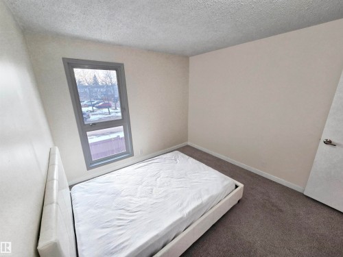 14017 121 Street, Edmonton, AB - Indoor Photo Showing Bedroom