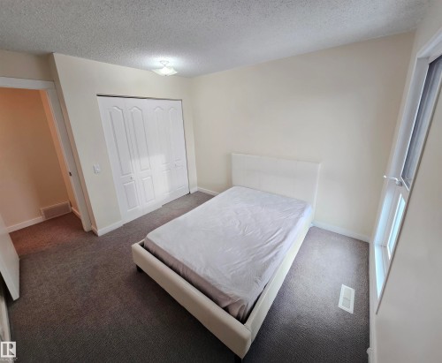 14017 121 Street, Edmonton, AB - Indoor Photo Showing Bedroom