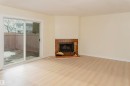 14017 121 Street, Edmonton, AB  - Indoor Photo Showing Living Room With Fireplace 