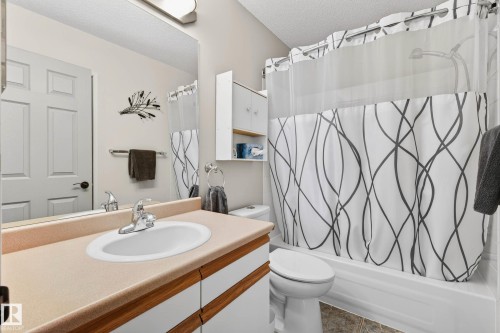 Bathroom featuring a vanity with a light-colored countertop and an integrated sink - 34 Donald Place, St. Albert, AB - Indoor Photo Showing Bathroom