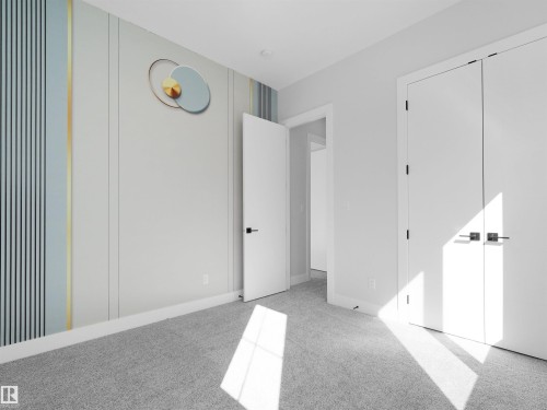 Light gray carpeting throughout - 6722 Crawford Way, Edmonton, AB - Indoor Photo Showing Other Room