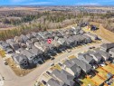 Aerial view of a residential community featuring rows of contemporary homes - 6722 Crawford Way, Edmonton, AB  - Outdoor With View 