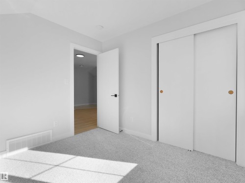 Room featuring light gray carpeting, crisp white walls, and a recessed ceiling light fixture - 6722 Crawford Way, Edmonton, AB - Indoor