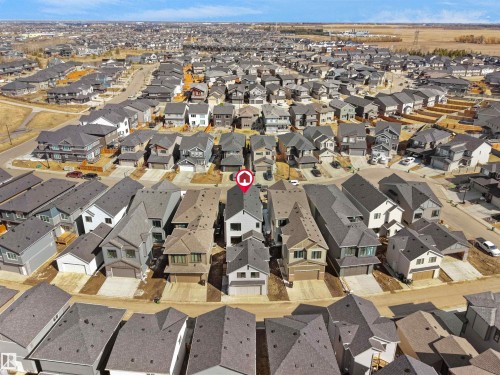 Aerial view of a residential neighborhood featuring diverse architectural styles and varying rooflines - 6722 Crawford Way, Edmonton, AB - Outdoor With View