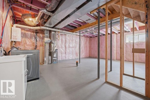 Unfinished basement offering expansive space with concrete flooring - Edmonton, AB - Indoor Photo Showing Basement