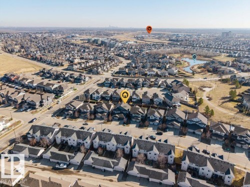 Aerial perspective of a residential neighborhood with detached homes and townhouses - Edmonton, AB - Outdoor With View