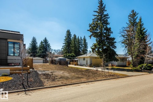 Vacant lot featuring cleared ground and mature trees - 14013 101 Avenue, Edmonton, AB 