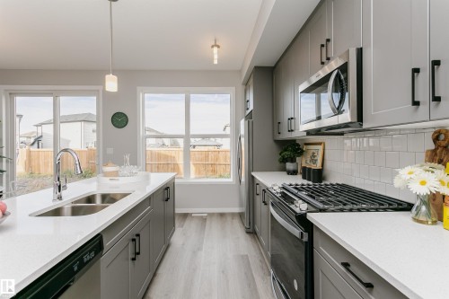 2518 151A Avenue, Edmonton, AB - Indoor Photo Showing Kitchen With Double Sink With Upgraded Kitchen