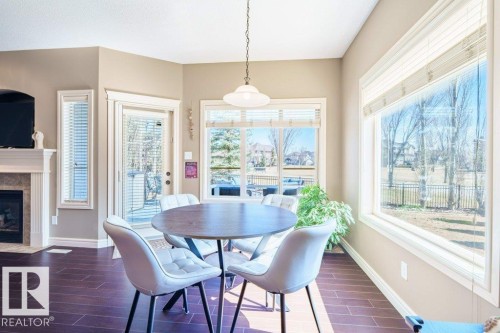 2241 Austin Way, Edmonton, AB - Indoor Photo Showing Dining Room With Fireplace