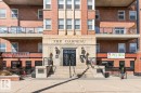 Brick exterior building featuring a stone entryway with "The Garneau" inscription - 109 10728 82 Avenue, Edmonton, AB  - Outdoor With Facade 