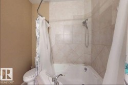 Soaking tub with integrated jets and chrome fixtures - 
