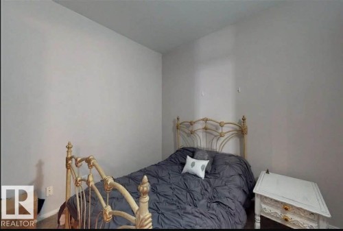 Image quality insufficient for description - 109 10728 82 Avenue, Edmonton, AB - Indoor Photo Showing Bedroom
