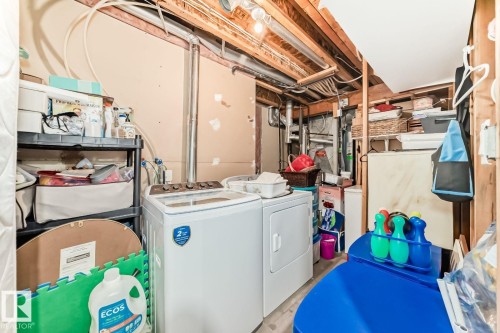 Unfinished basement area featuring exposed ceiling joists and utility piping - 715 Hudson Place, Edmonton, AB - Indoor Photo Showing Basement