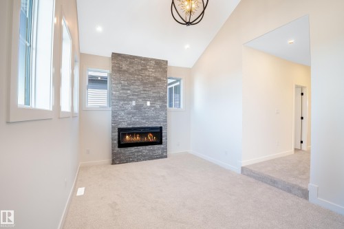 119 Lilac Close, Leduc, AB - Indoor With Fireplace