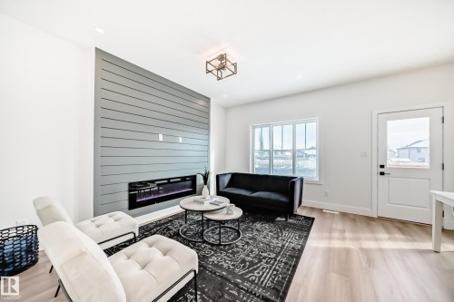 77 Elliott Wynd, Fort Saskatchewan, AB - Indoor Photo Showing Living Room