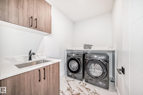 77 Elliott Wynd, Fort Saskatchewan, AB - Indoor Photo Showing Laundry Room