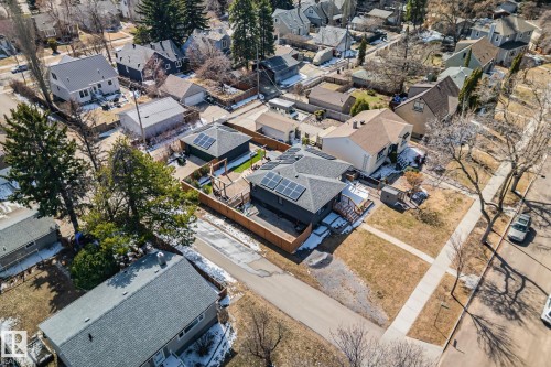 Aerial perspective showcasing a residential street with multiple properties - 13635 108 Avenue, Edmonton, AB - Outdoor With View