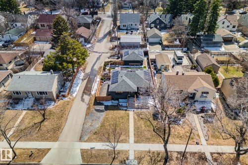 Residential neighborhood featuring a variety of housing styles, concrete sidewalks, and mature trees - 13635 108 Avenue, Edmonton, AB - Outdoor With View