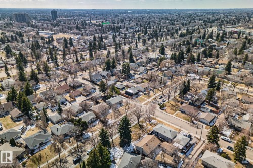 Extensive residential area featuring numerous detached homes with diverse rooflines and mature tree coverage - 13635 108 Avenue, Edmonton, AB - Outdoor With View