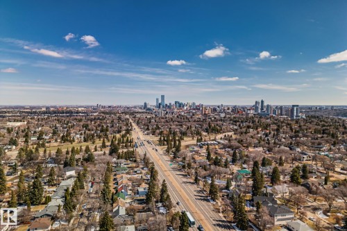 Expansive urban landscape featuring a distant city skyline - 13635 108 Avenue, Edmonton, AB - Outdoor With View