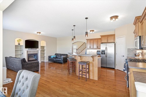 8027 3 Avenue, Edmonton, AB - Indoor Photo Showing Kitchen With Fireplace