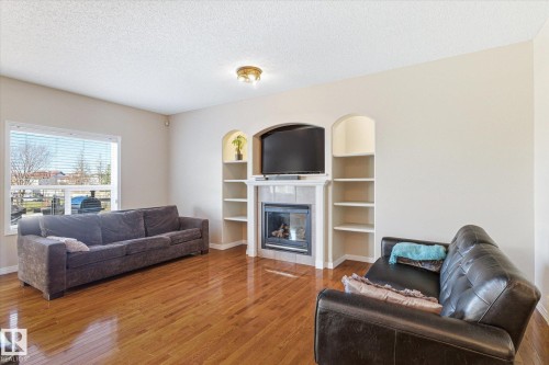 8027 3 Avenue, Edmonton, AB - Indoor Photo Showing Living Room With Fireplace