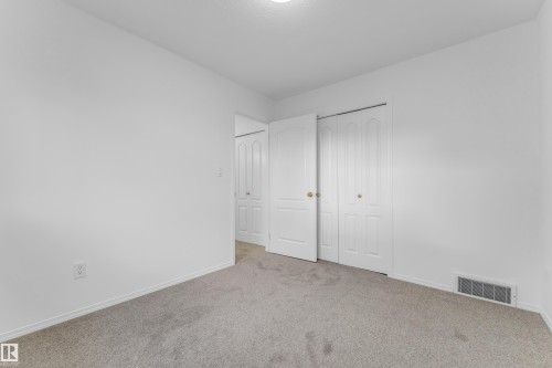 Light-toned carpeted flooring complements neutral wall tones - 4103 37A Avenue, Edmonton, AB - Indoor Photo Showing Other Room