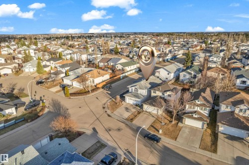 Aerial perspective showcasing a residential neighborhood with numerous detached homes, paved streets, and mature trees - 4103 37A Avenue, Edmonton, AB - Outdoor With View