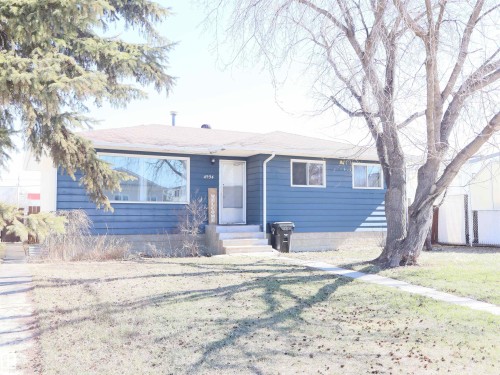 Ranch-style residence featuring blue horizontal siding and white trim - 4934 49 Avenue, Barrhead, AB - Outdoor