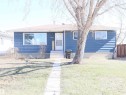 Blue horizontal siding exterior with white trim - 4934 49 Avenue, Barrhead, AB  - Outdoor 