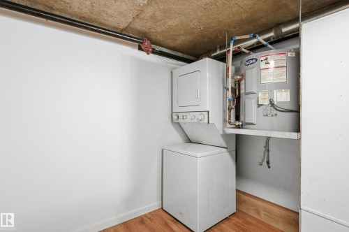 1805 10024 Jasper Avenue, Edmonton, AB - Indoor Photo Showing Laundry Room