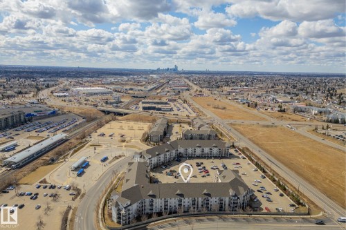 Multi-story residential buildings featuring gabled roofs and individual balconies - 1306 330 Clareview Station Drive, Edmonton, AB - Outdoor With View
